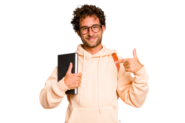 Young caucasian student man isolated person pointing by hand to a shirt copy space, proud and confident