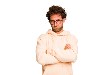 Young caucasian curly hair man isolated Young caucasian man with curly hair isolated unhappy looking in camera with sarcastic expression.