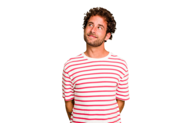 Young caucasian curly hair man isolated Young caucasian man with curly hair isolated relaxed and happy laughing, neck stretched showing teeth.
