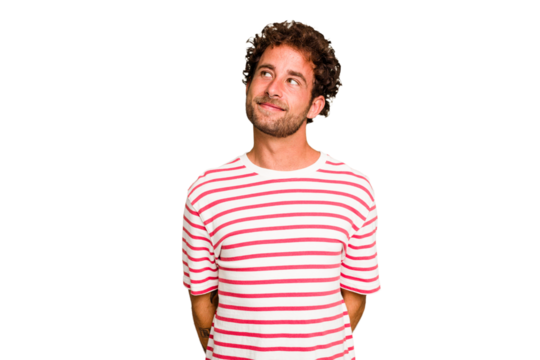 Young caucasian curly hair man isolated Young caucasian man with curly hair isolated relaxed and happy laughing, neck stretched showing teeth.