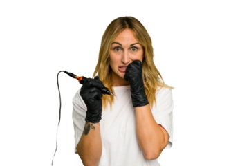 Tattoo artist caucasian woman isolated on green chroma background biting fingernails, nervous and very anxious.