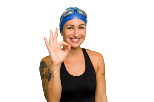 Young caucasian swimmer woman isolated on green chroma background cheerful and confident showing ok gesture. - Powered by Adobe