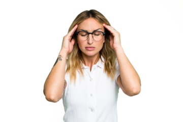 Young caucasian woman isolated on green chroma background touching temples and having headache.