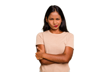 Young Indian woman isolated frowning face in displeasure, keeps arms folded.