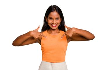 Young Indian woman isolated surprised pointing with finger, smiling broadly.