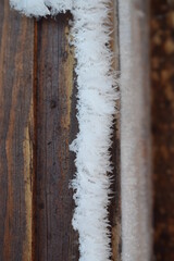 snow crystals on a wooden board