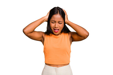 Young Indian woman isolated covering ears with hands trying not to hear too loud sound.