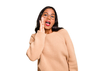 Young Indian woman isolated shouting excited to front.