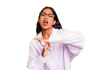 Young Indian woman isolated showing a timeout gesture.