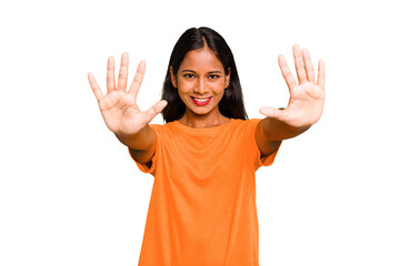 Young Indian woman isolated showing number ten with hands.