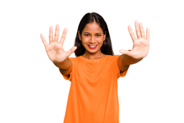 Young Indian woman isolated showing number ten with hands.