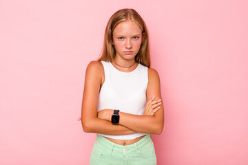 Caucasian teen girl isolated on pink background unhappy looking in camera with sarcastic expression.