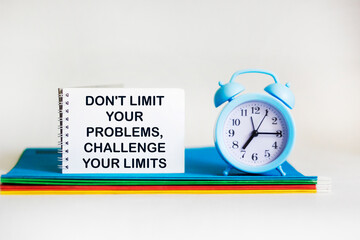 Motivational and inspirational quote - Don't limit your problems, challenge your limits.