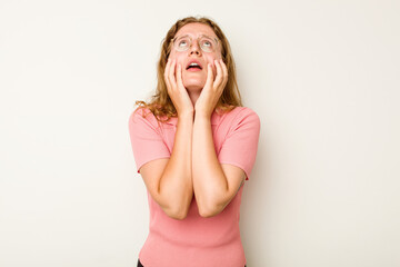 Young caucasian woman isolated on white background whining and crying disconsolately.