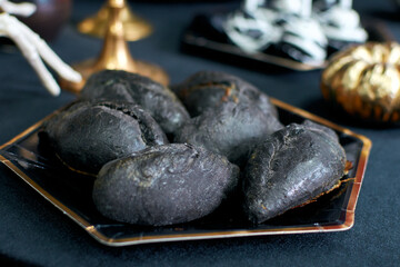 Black meat pie. Dishes for Halloween. Kibinai, kybyn, or kibin- a meat pie, a national dish of the Lithuanian Karaites