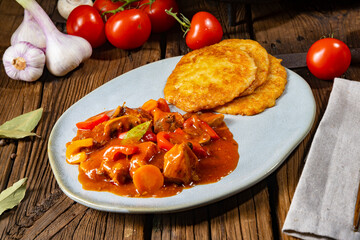 Hungarian goulash with potato pancakes