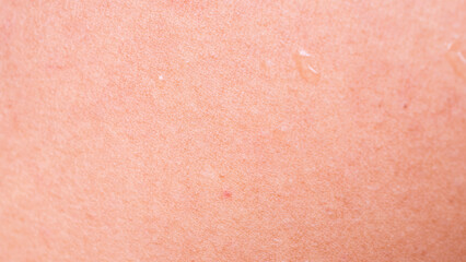 Fototapeta premium human skin texture background texture with water drop abstract close-up