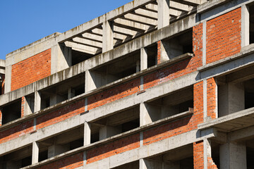 Abandoned residential apartment building construction site. Construction industry affected by the increased prices.