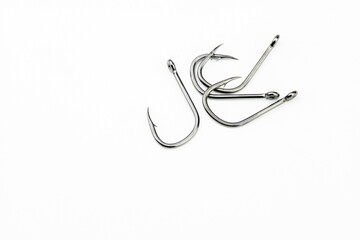  set of or heap of fishing hooks isolated on white background 