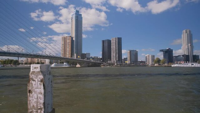 City of Rotterdam waterway. skyline from the city of rotterdam with the erasmus bridge