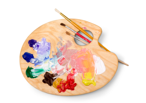 Wooden art palette with blobs of paint and a brushes on white background