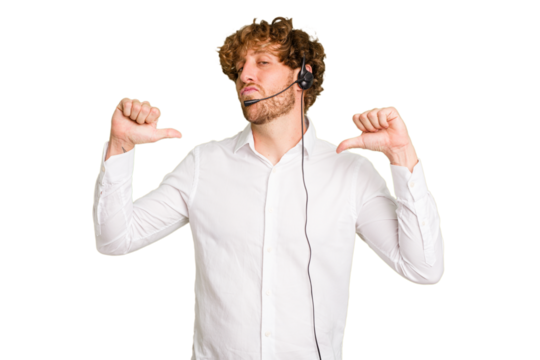 Telemarketer man working with a headset isolated on green chroma background feels proud and self confident, example to follow.