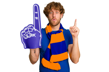 Young caucasian sports fan man isolated on white background having some great idea, concept of creativity.