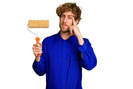 Young painter man holding a roll isolated on white background pointing temple with finger, thinking, focused on a task.