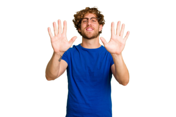 Young caucasian man isolated on green chroma background showing number ten with hands.