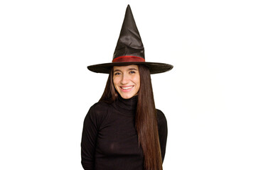 Fototapeta premium Young caucasian woman dressed as a witch for halloween day isolated happy, smiling and cheerful.