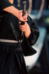 Fototapeta na wymiar 日本刀を構える人物（Demonstration of Japanese sword）
