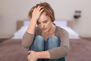 Sad young woman feel pain or problems