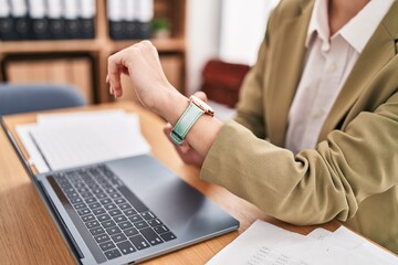 Young blonde woman business worker working at office