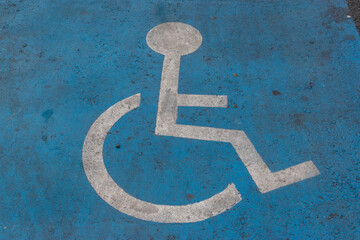 road marking on the road, person in a wheelchair