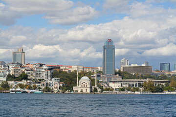 Fototapeta premium Istanbul water view, mansion, boats, sky and clouds
