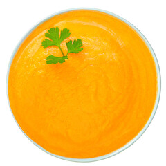 Squash Cream soup isolated on a white background. Bowl of Autumn cream-soup Top view.