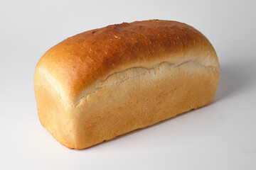 loaf of white bread on a white background