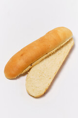hot dog bun cut lengthwise on a white background
