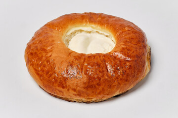 cheesecake with cottage cheese on a white background, close view