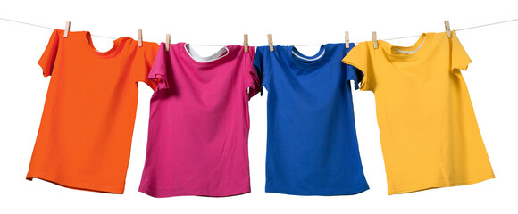 Colorful T-shirts hanging on a rope on a white background