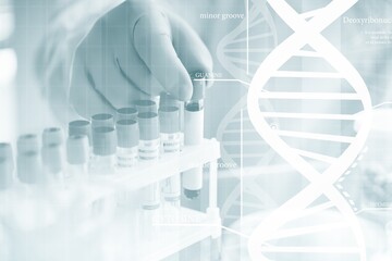 Scientists man with molecule of DNA with light background.