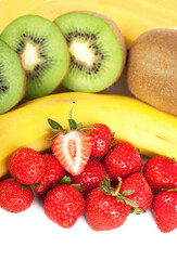 Bananas, kiwi and strawberry isolated on a white background
