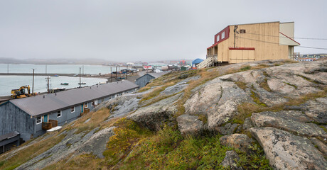 Houses on a Rocky Ridge overlooking the Arctic Ocean and harbor in Iqaluit