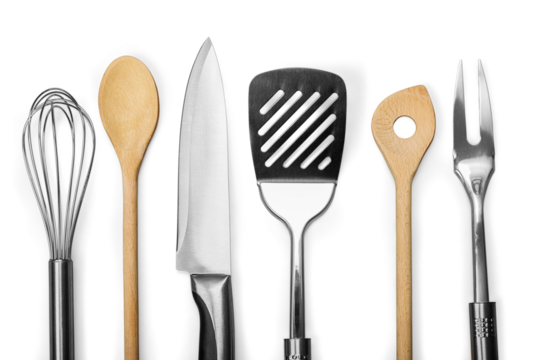 Set of modern steel kitchen utensils on wooden table