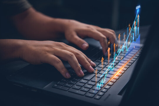Businessman analysing forex trading graph financial data and Digital Assets. Business finance background. Hand use laptop business finance technology and Stock Market Investments Funds concept.