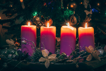 four burning advent candles