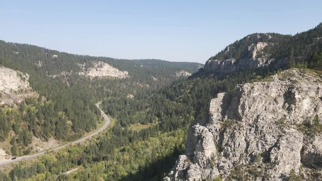 Drone orbiting around canyon edge in Spearfish Canyon