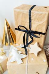 Christmas, gifts, Christmas tree, decorations. The concept of preparing for the holiday, buying and wrapping gifts.