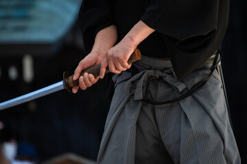 Fototapeta premium 日本刀を構える人物（Demonstration of Japanese sword）