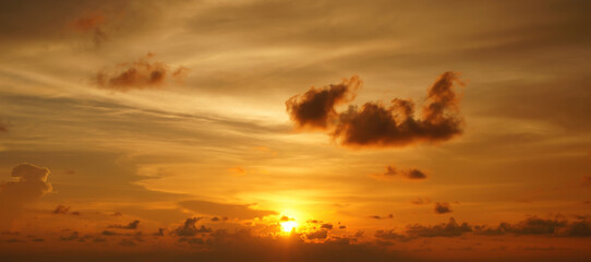 Fototapeta na wymiar Beautiful sunset sky with some clouds